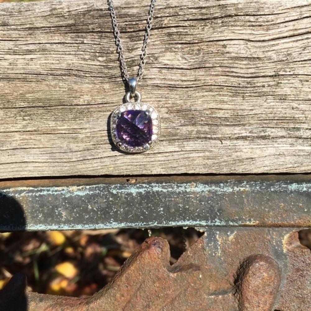 Purple crystal in beautiful setting necklace